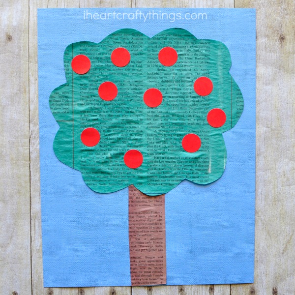 This simple painted newspaper apple tree craft is perfect for a preschool apple theme and fall kids craft. Fun apple craft for kids, recycled newspaper craft, preschool craft and fall craft for kids.